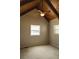 Bedroom with high wood ceilings, carpet, and two bright windows at 1044 Academy Rd, Walterboro, SC 29488