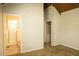 Bedroom featuring high ceilings, carpet, and an attached bathroom at 1044 Academy Rd, Walterboro, SC 29488