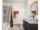 The bathroom features a modern vanity with a vessel sink, a tub-shower, and a round mirror at 107 Salina Ln, Goose Creek, SC 29445