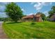 Charming brick home with a well-maintained front yard and mature trees and convenient ramp at 107 Salina Ln, Goose Creek, SC 29445