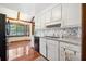 Modern kitchen with white cabinetry, granite countertops, and stainless steel appliances at 107 Salina Ln, Goose Creek, SC 29445
