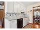 Well-lit kitchen featuring ample cabinet space, granite countertops, and stainless steel appliances at 107 Salina Ln, Goose Creek, SC 29445
