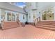 Large brick patio with steps and walkways lead to the home's multiple entrances at 111 Long Bow Rd, Summerville, SC 29485