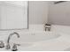 Soaking tub in this bright bathroom features tiled surround and chrome hardware at 111 Long Bow Rd, Summerville, SC 29485