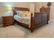 Bedroom with a decorative bed, furnishings, and neutral carpeting at 111 Long Bow Rd, Summerville, SC 29485
