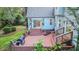 Wide shot of the brick patio with stairs and railings leading up to the back doors at 111 Long Bow Rd, Summerville, SC 29485