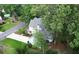 Aerial view of a charming home with mature trees, a well-maintained lawn, and a classic architectural style at 111 Long Bow Rd, Summerville, SC 29485