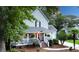 Classic home showcasing inviting front porch perfect for enjoying neighborhood views and relaxation at 111 Long Bow Rd, Summerville, SC 29485