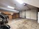 Spacious two-car garage with storage, lighting, and an elevated boat storage system at 111 Long Bow Rd, Summerville, SC 29485