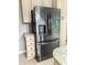 Modern kitchen featuring stainless steel refrigerator and granite countertops at 111 Long Bow Rd, Summerville, SC 29485
