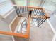 Unique staircase with wooden handrails and a modern metal design, viewed from above at 111 Long Bow Rd, Summerville, SC 29485