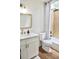 Neutral bathroom featuring white vanity, and shower with neutral walls and floors at 1119 Morning Glory Ct, Mount Pleasant, SC 29464