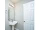 This bathroom features a pedestal sink, bright lighting and is ready for your design touches at 113 Lebsl Ct, Summerville, SC 29483