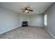 Cozy living room features a fireplace, neutral colors, and bright windows at 113 Lebsl Ct, Summerville, SC 29483