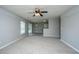 Bright living room features a ceiling fan and tile flooring in breakfast nook at 113 Lebsl Ct, Summerville, SC 29483