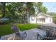 Beautifully landscaped backyard with lush lawn, patio area, and inviting seating for relaxation at 1151 Camellia Dr, Mount Pleasant, SC 29464