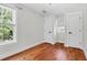Bedroom with hardwood floors, natural light, and a view of the outside at 1151 Camellia Dr, Mount Pleasant, SC 29464