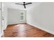 Bright bedroom with hardwood floors, ceiling fan, and a window offering natural light at 1151 Camellia Dr, Mount Pleasant, SC 29464