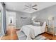 Comfortable bedroom with hardwood floors, neutral walls, and a cozy rug at 1151 Camellia Dr, Mount Pleasant, SC 29464