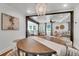 Elegant dining room with views into the kitchen and living room, perfect for entertaining at 1151 Camellia Dr, Mount Pleasant, SC 29464
