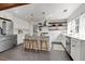 Beautiful kitchen featuring white cabinets, stainless steel appliances, and an island with seating, perfect for cooking and entertaining at 1151 Camellia Dr, Mount Pleasant, SC 29464