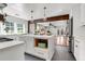 Bright kitchen features a large island with pendant lighting and an open layout to the living room at 1151 Camellia Dr, Mount Pleasant, SC 29464