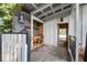 Inviting outdoor kitchen setup with grill, workspace, and convenient access to the yard at 1151 Camellia Dr, Mount Pleasant, SC 29464
