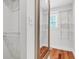 Bright walk-in closet featuring white wire shelving and a wooden floor at 1151 Camellia Dr, Mount Pleasant, SC 29464