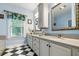 Charming bathroom with double sinks, ornate mirrors, and plenty of counter space at 127 White Pine Way, Summerville, SC 29485