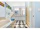 Bathroom features double sinks, black and white tile, and large garden tub at 127 White Pine Way, Summerville, SC 29485