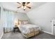 Cozy bedroom featuring a charming bed, ceiling fan, and soft lighting with blue and floral accents at 127 White Pine Way, Summerville, SC 29485