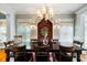 Elegant dining room featuring a large table, decorative lighting, and stylish decor at 127 White Pine Way, Summerville, SC 29485