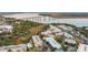 An aerial view of a coastal condo community near a bridge with fall colors and marshy waterways at 130 River Landing Dr # 8203, Charleston, SC 29492