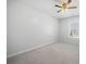 A well-lit bedroom featuring neutral walls, ceiling fan, and plush carpet at 1309 Berry Grove Dr, Summerville, SC 29485