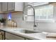 Modern kitchen features stainless steel sink with detachable sprayer and subway tile backsplash at 1309 Berry Grove Dr, Summerville, SC 29485