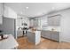 Spacious kitchen with white countertops, gray cabinets, and stainless steel appliances at 1309 Berry Grove Dr, Summerville, SC 29485
