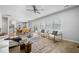 Bright living room featuring hardwood floors, a ceiling fan, and comfortable seating at 1309 Berry Grove Dr, Summerville, SC 29485