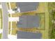 Overhead drone image of a residence with a dark roof, screened in porch and fenced backyard at 1384 Locals St, Summerville, SC 29485