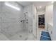 Bright bathroom with a large, glass enclosed shower featuring marble tile and a tiled floor at 1384 Locals St, Summerville, SC 29485