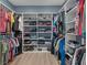Spacious walk-in closet with custom shelving, rods, and ample storage space at 1384 Locals St, Summerville, SC 29485