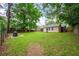 Expansive backyard featuring lush green grass and privacy fence at 14 Aldene Ave, Goose Creek, SC 29445