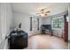 Bedroom featuring laminate flooring, ceiling fan, and two windows at 14 Aldene Ave, Goose Creek, SC 29445
