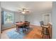 Open dining area with a ceiling fan and view into the kitchen at 14 Aldene Ave, Goose Creek, SC 29445