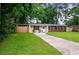Charming single-story home with brick accents and a spacious front yard at 14 Aldene Ave, Goose Creek, SC 29445