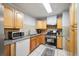 Traditional kitchen with tiled floor and stainless steel appliances at 14 Aldene Ave, Goose Creek, SC 29445