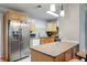 Well-lit kitchen featuring granite countertops and stainless steel appliances at 14 Aldene Ave, Goose Creek, SC 29445