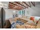 Comfortable living room area with laundry hookups and vaulted ceiling at 14 Aldene Ave, Goose Creek, SC 29445