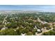 Expansive aerial view of a verdant residential neighborhood, near marshlands and waterways, offering a serene coastal living experience at 1405 Mataoka St, Mount Pleasant, SC 29464