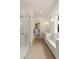 Modern bathroom features large shower, storage, and walk-in closet access at 1405 Mataoka St, Mount Pleasant, SC 29464