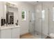 Modern bathroom features a glass shower, vanity, and ample natural light at 1405 Mataoka St, Mount Pleasant, SC 29464